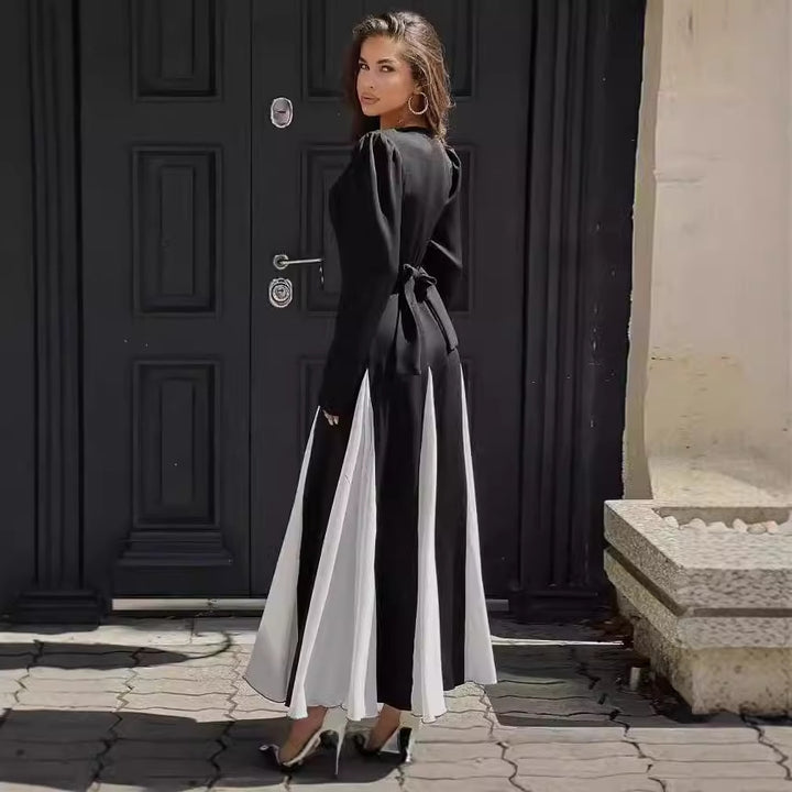 Damernas Elegant Långärmad Klänning med Puffärmar och Flödande Söm Mirla-Eva Jonsson