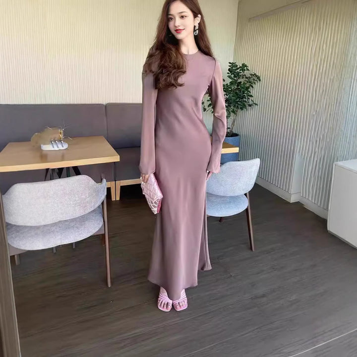 Damernas Elegant Maxi Klänning med smickrande snitt och utsvängda ärmar Mirla-Eva Jonsson