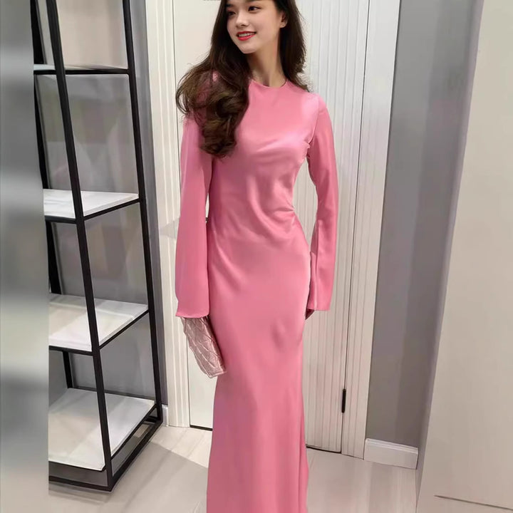 Damernas Elegant Maxi Klänning med smickrande snitt och utsvängda ärmar Mirla-Eva Jonsson