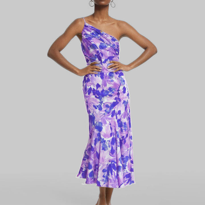 Damernas Elegant Maxiklänning med Asymmetrisk Rem och Blommönster Mirla-Eva Jonsson