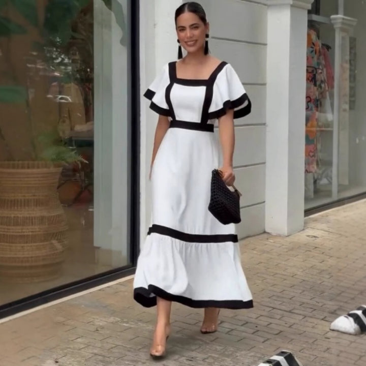 Damernas Elegant Maxiklänning med kontrasterande volangdetaljer Mirla-Eva Jonsson