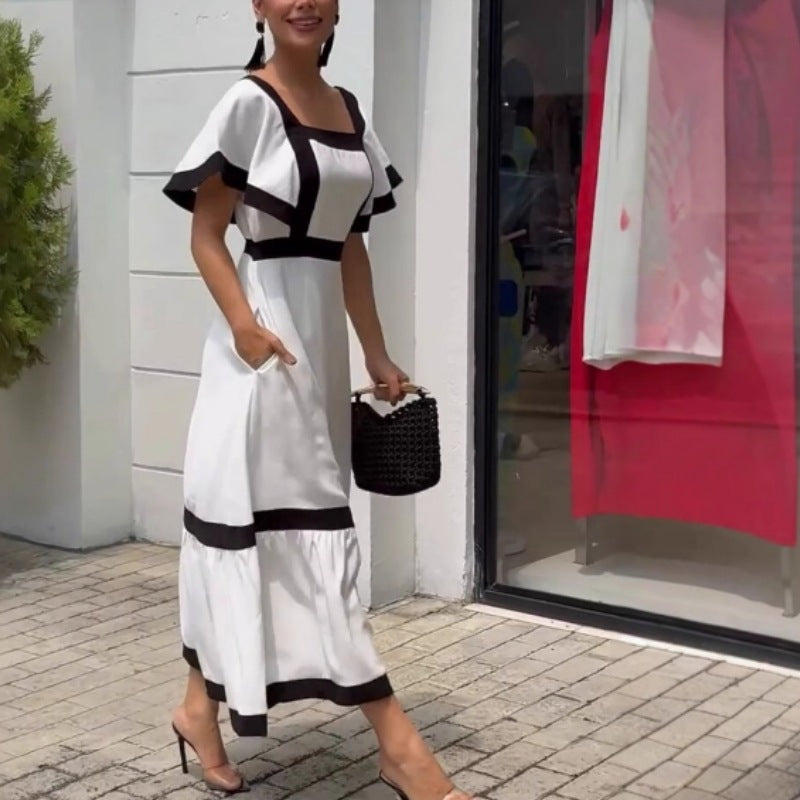 Damernas Elegant Maxiklänning med kontrasterande volangdetaljer Mirla-Eva Jonsson