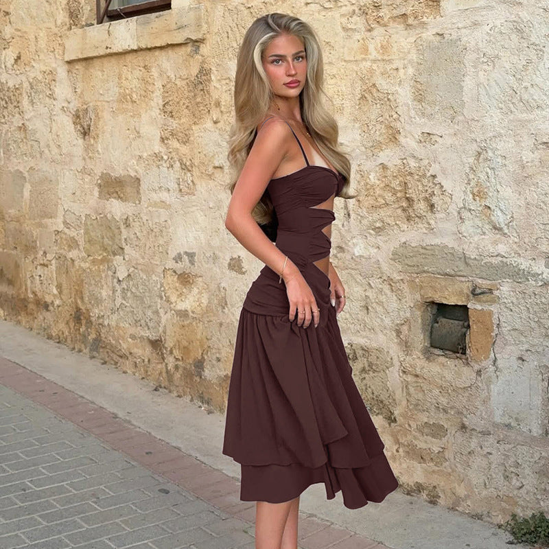 Damernas Eleganta In wraps klänning med raffinerade draperingar och lekfulla cut-outs Mirla-Eva Jonsson
