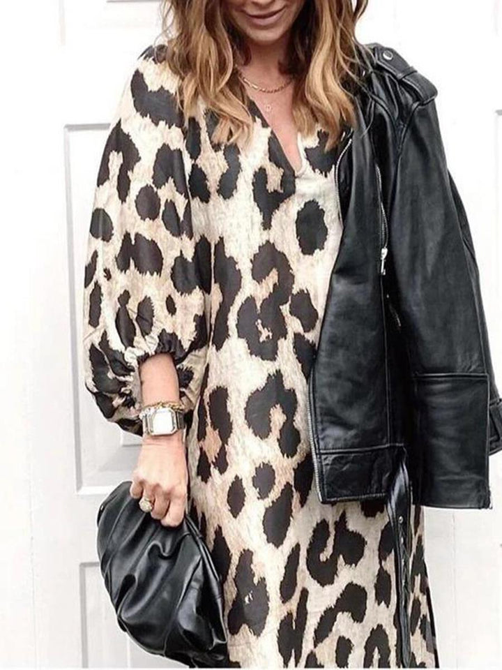 Damernas Eleganta Leo-Midiklänning med V-ringning och vida ärmar Mirla-Eva Jonsson