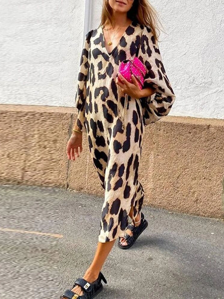 Damernas Eleganta Leo-Midiklänning med V-ringning och vida ärmar Mirla-Eva Jonsson