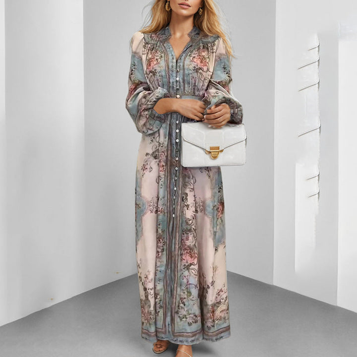Damernas Eleganta Maxiklänning med Konstfull Blommönster och Figurformande Bälte Mirla-Eva Jonsson