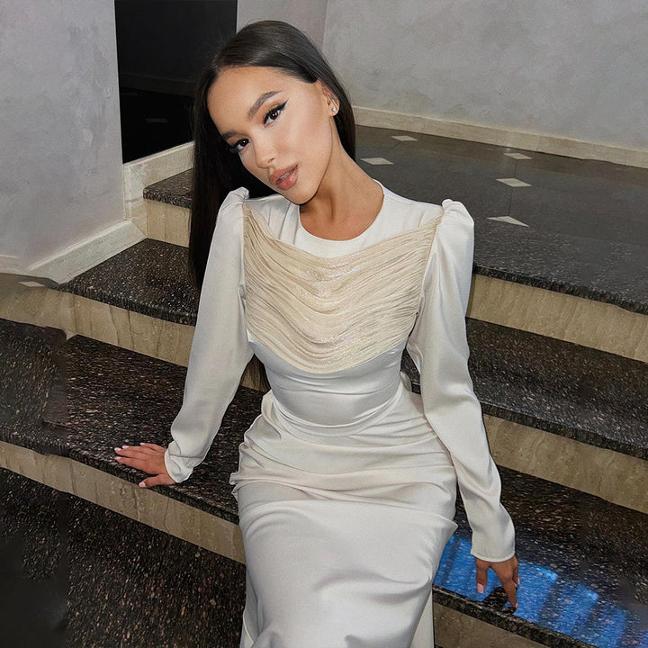 Damernas Eleganta Maxiklänning med raffinerade draperingsdetaljer och lång ärm Mirla-Eva Jonsson