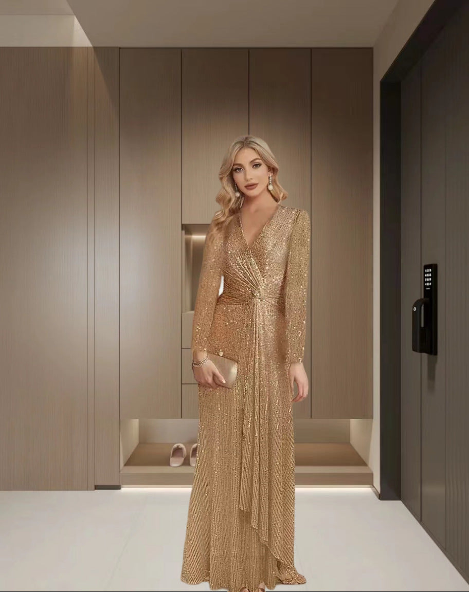 Damernas Eleganta Paljett Aftonklänning med Vickningslook och Långa Ärmar Mirla-Eva Jonsson
