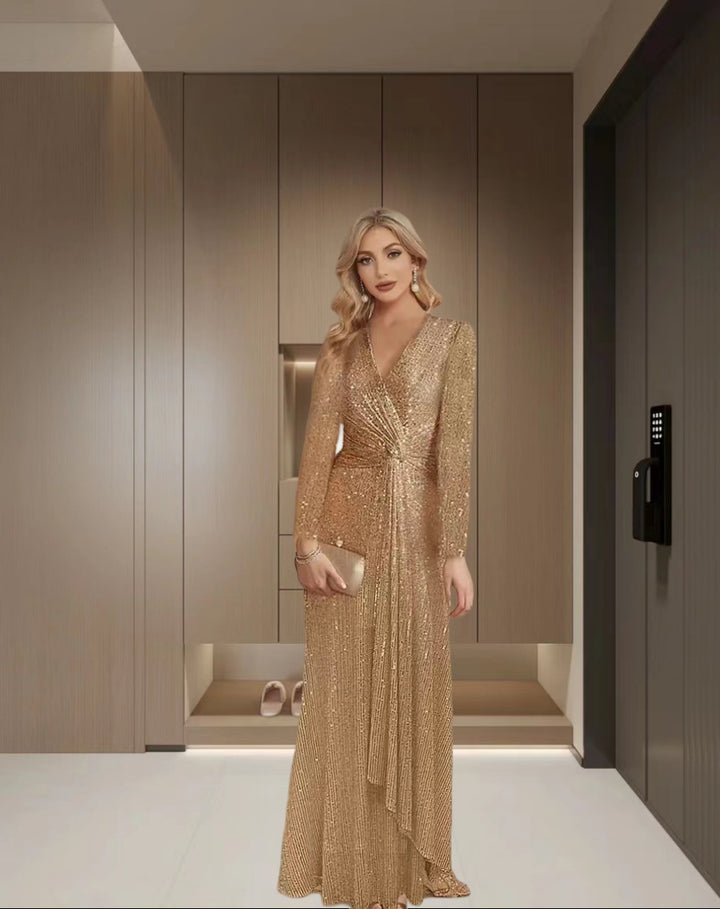 Damernas Eleganta Paljett Aftonklänning med Vickningslook och Långa Ärmar Mirla-Eva Jonsson