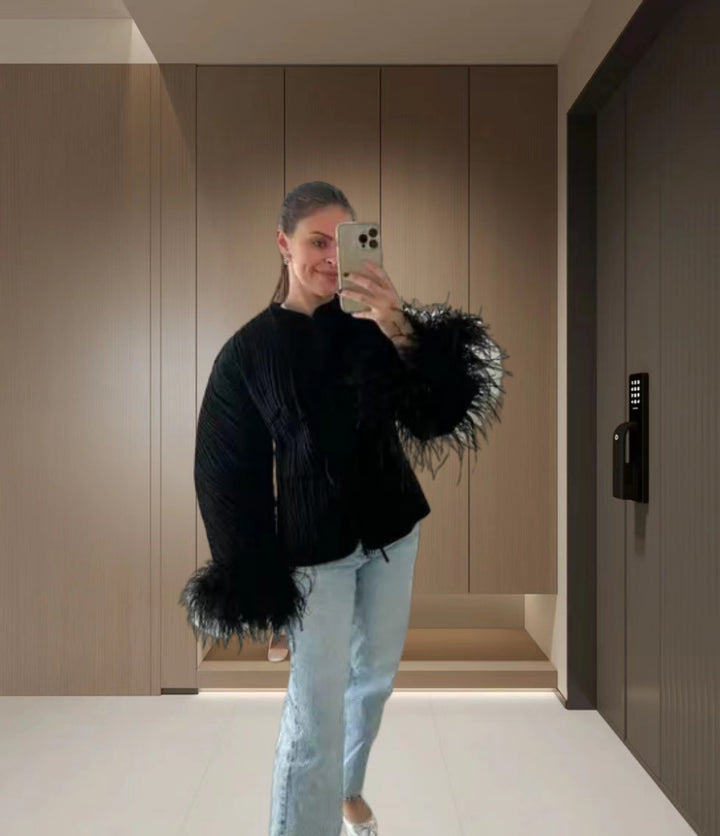 Damernas Eleganta Stickad Jacka med voluminösa Ärmar och fint Mönster Mirla-Eva Jonsson