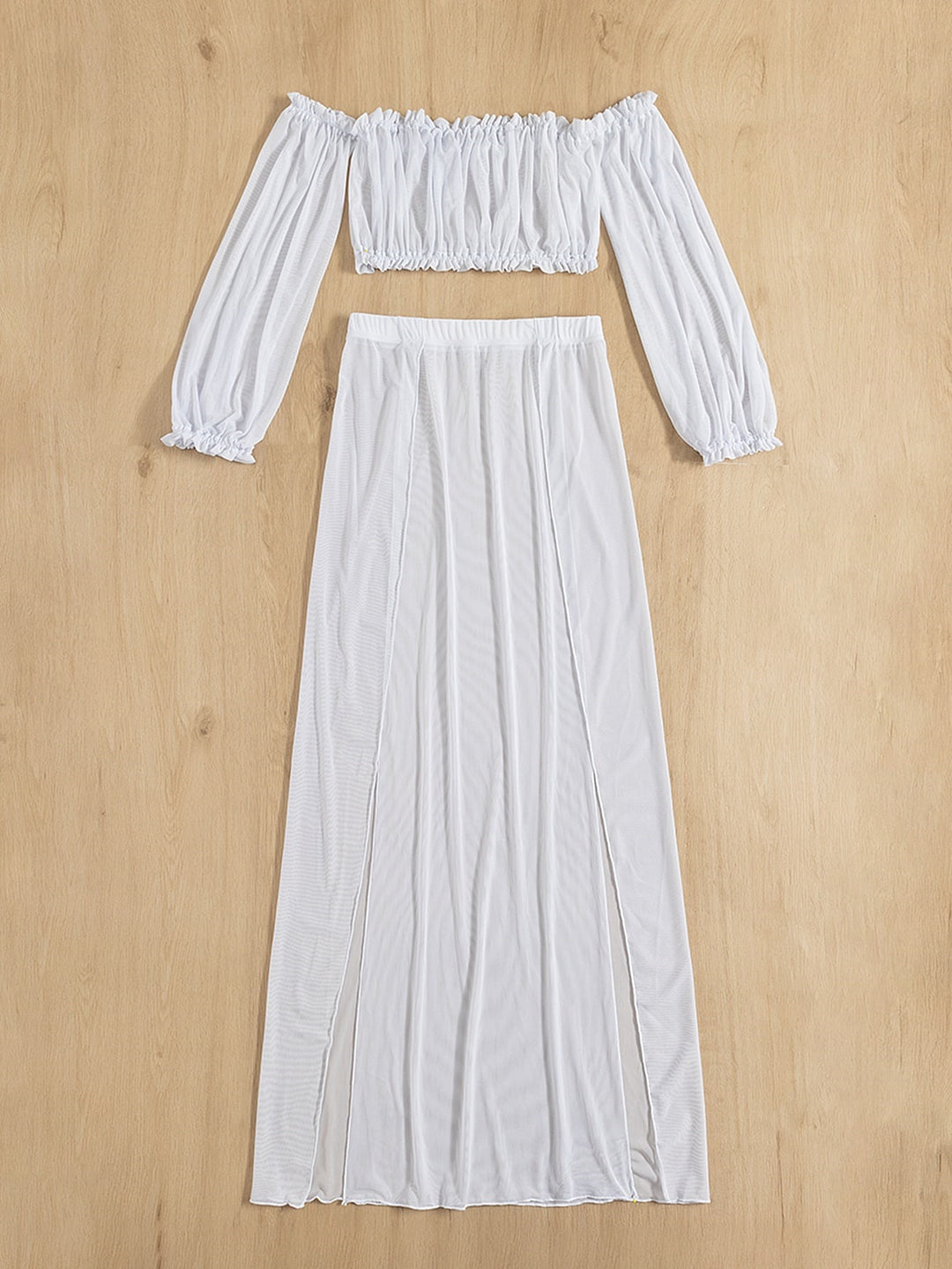 Damernas Eleganta Strandklänning med off-shoulder design och djupa sidsofterslitzar Eva Jonsson-Eva Jonsson