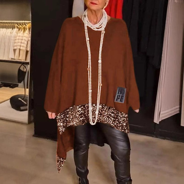 Damernas Eleganta och flödande asymmetriska stickade överdel Mirla-Eva Jonsson