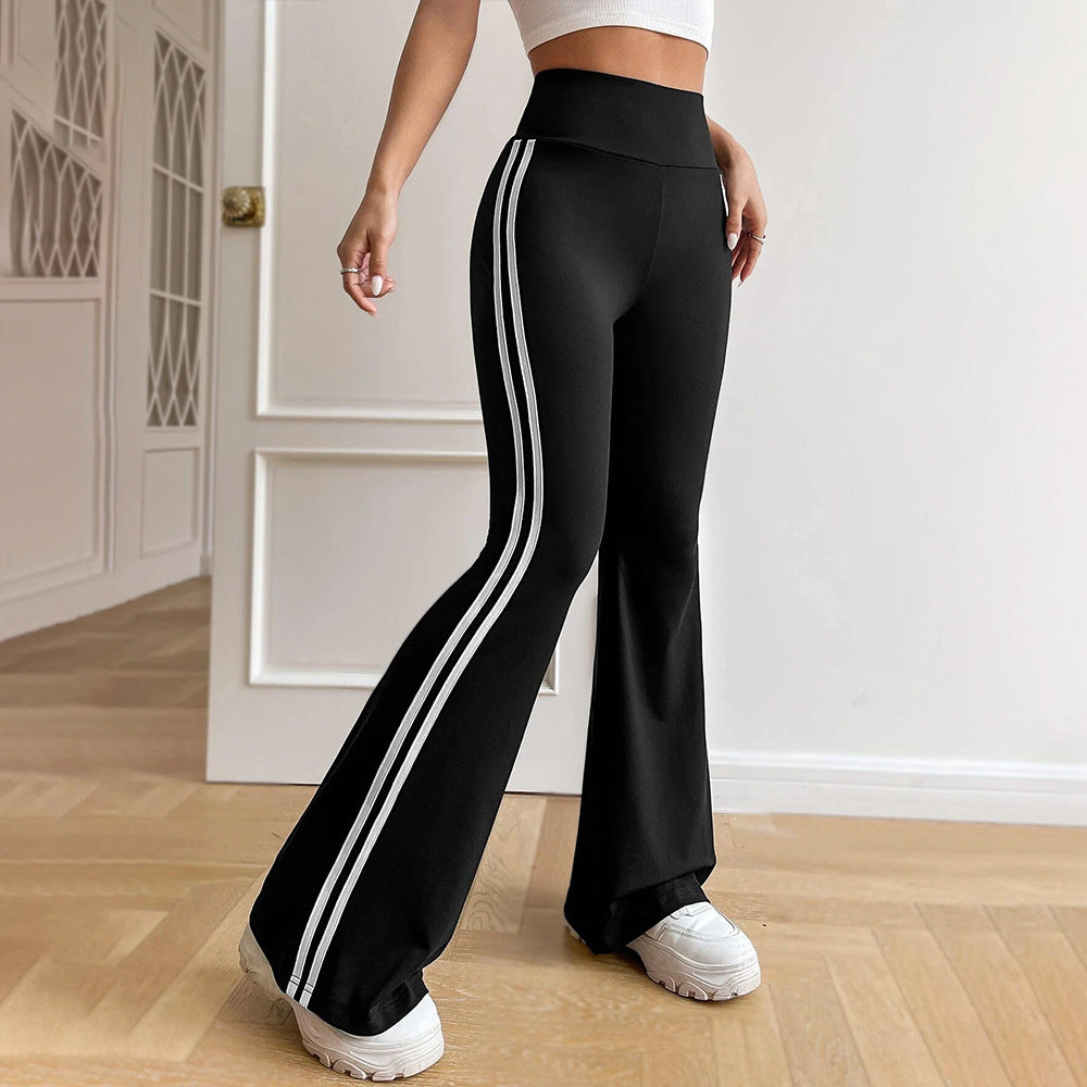 Damernas Flared Sportleggings med Hög Midja och SidoStripe Mirla-Eva Jonsson