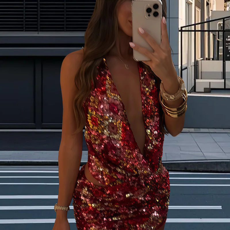 Damernas Glittrande Jumpsuit med djup V-urringning och svängande fåll Mirla-Eva Jonsson