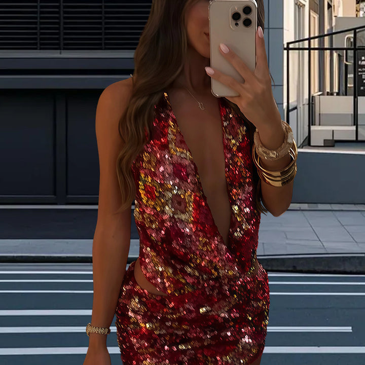 Damernas Glittrande Jumpsuit med djup V-urringning och svängande fåll Mirla-Eva Jonsson