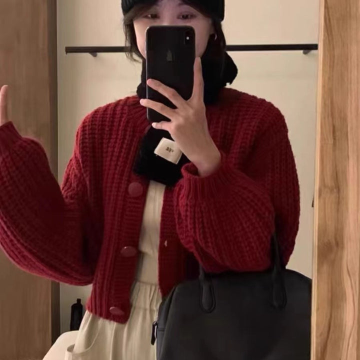 Damernas Grov Stickad Cardigan med Voluminösa Ärmar och Stora Knappar Mirla-Eva Jonsson