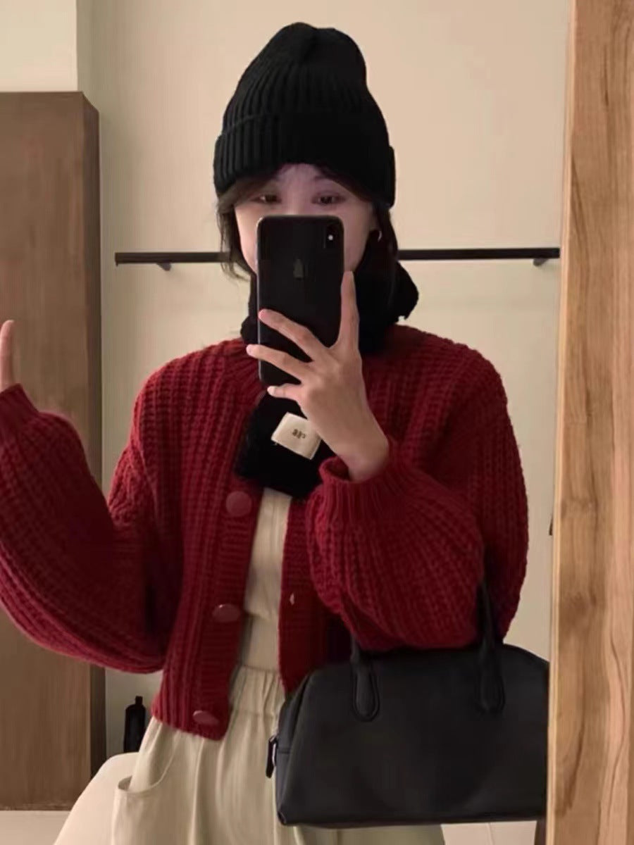 Damernas Grov Stickad Cardigan med Voluminösa Ärmar och Stora Knappar Mirla-Eva Jonsson