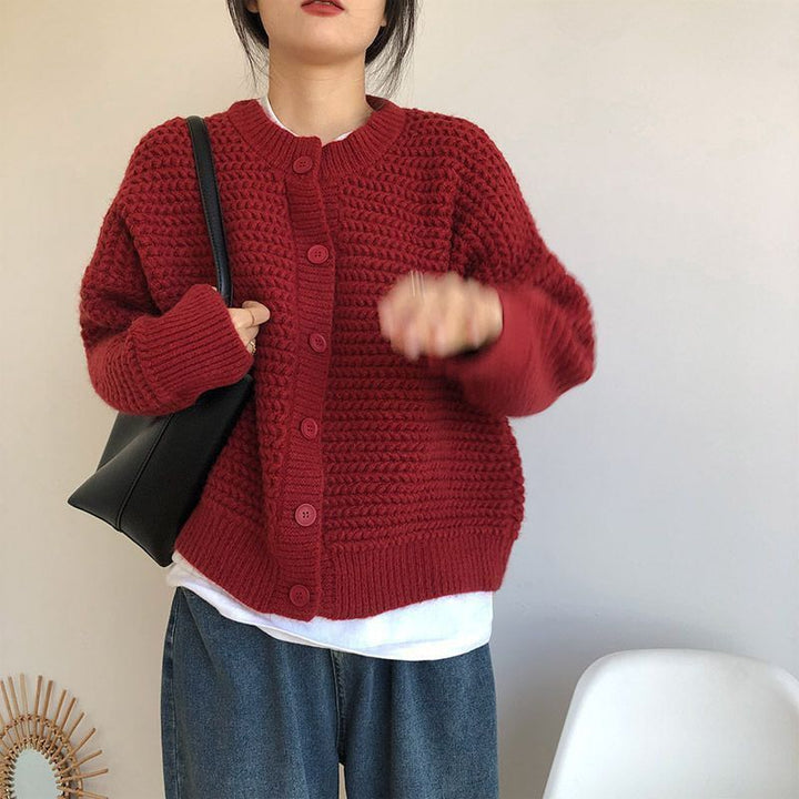 Damernas Grovstickad Jacka med Knappdetaljer och Oversized Snitt Mirla-Eva Jonsson