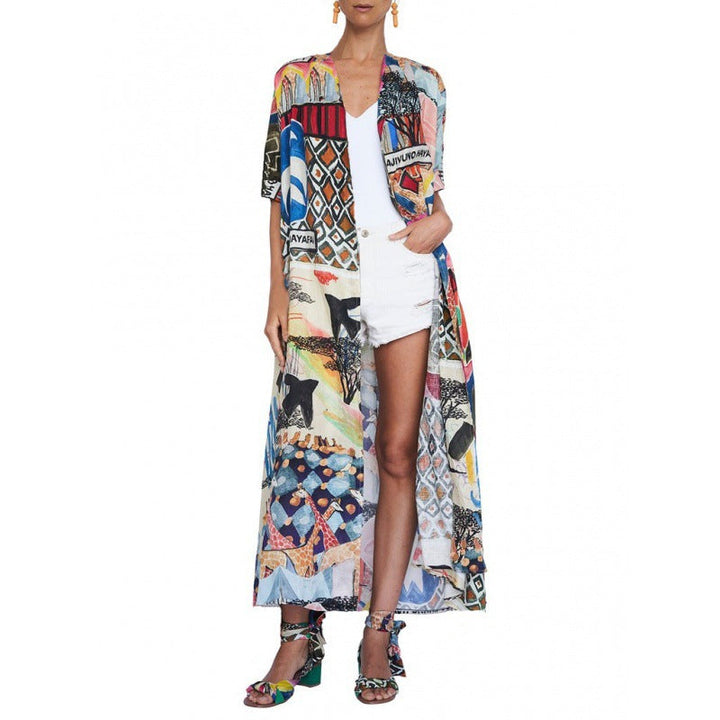 Damernas Kimono med Färgglad Patchwork-design och Flödande Tyg Mirla-Eva Jonsson