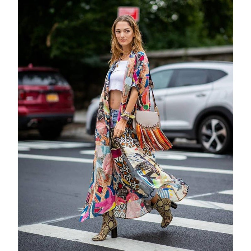 Damernas Kimono med Färgglad Patchwork-design och Flödande Tyg Mirla-Eva Jonsson