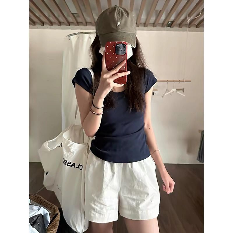 Damernas Kortärmad T-shirt Enfärgad Slim Fit-Eva Jonsson