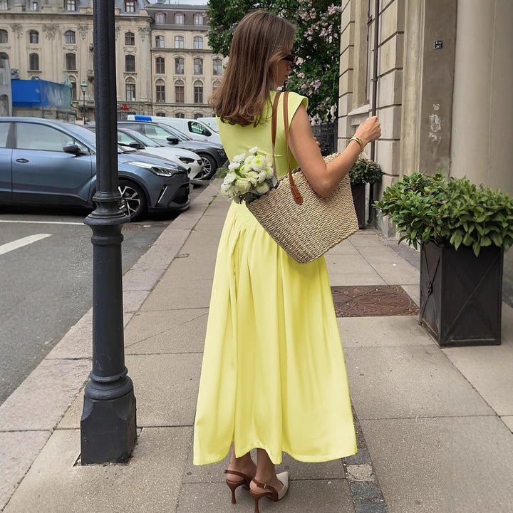 Damernas Långt figursmickrande sommarklänning med längs söm och elegant midja Mirla-Eva Jonsson