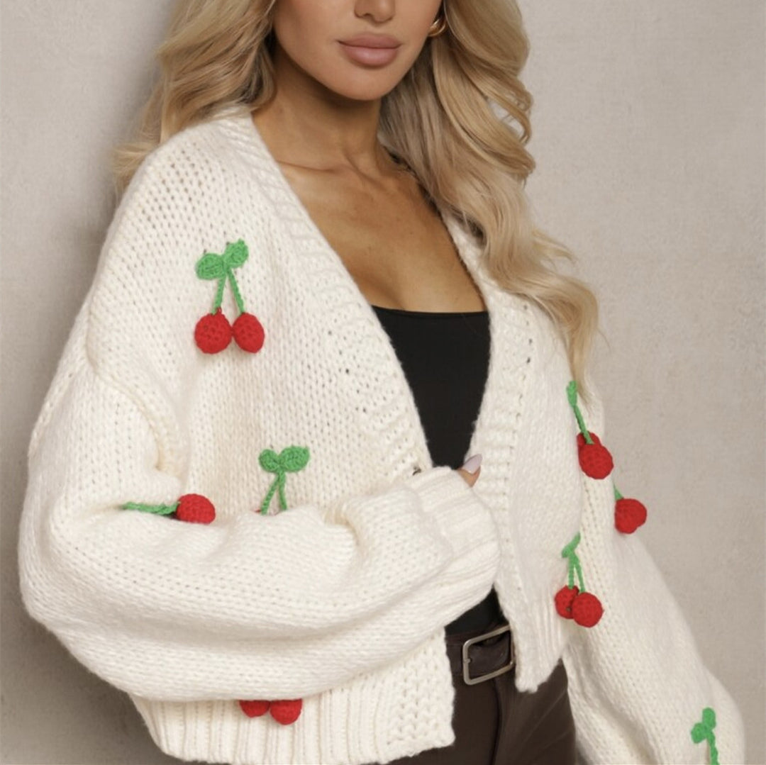 Damernas Lekfull cardigan i stickat med dekorativa detaljer Eva Jonsson-Eva Jonsson