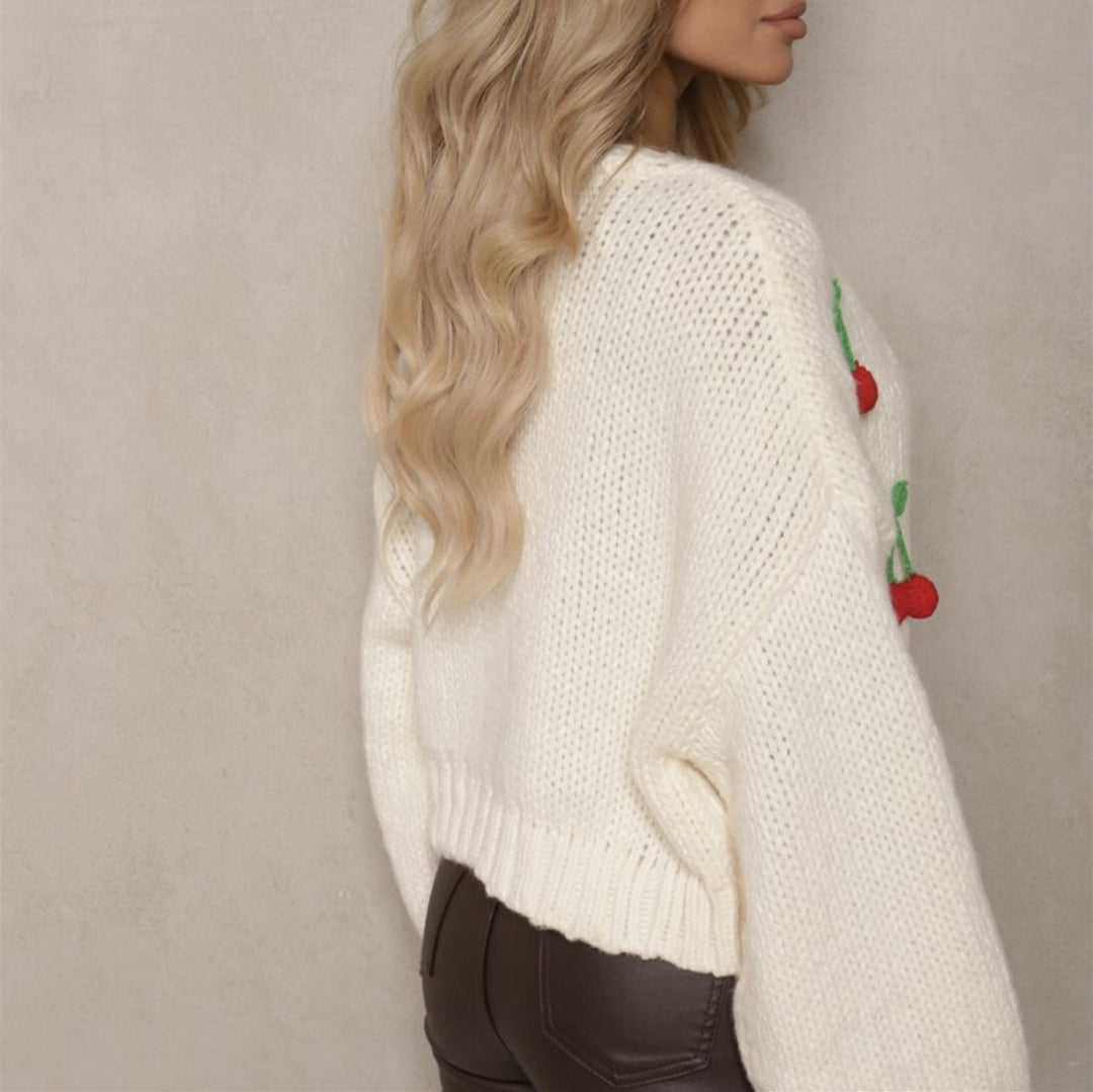 Damernas Lekfull cardigan i stickat med dekorativa detaljer Eva Jonsson-Eva Jonsson