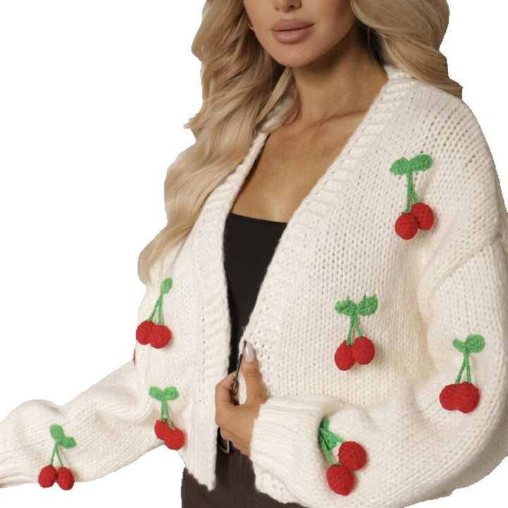 Damernas Lekfull cardigan i stickat med dekorativa detaljer Eva Jonsson-Eva Jonsson