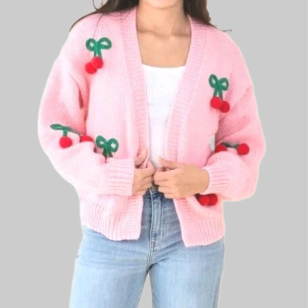 Damernas Lekfull cardigan i stickat med dekorativa detaljer Eva Jonsson-Eva Jonsson