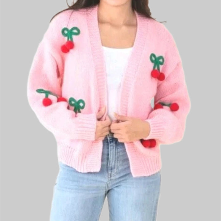 Damernas Lekfull cardigan i stickat med dekorativa detaljer Eva Jonsson-Eva Jonsson
