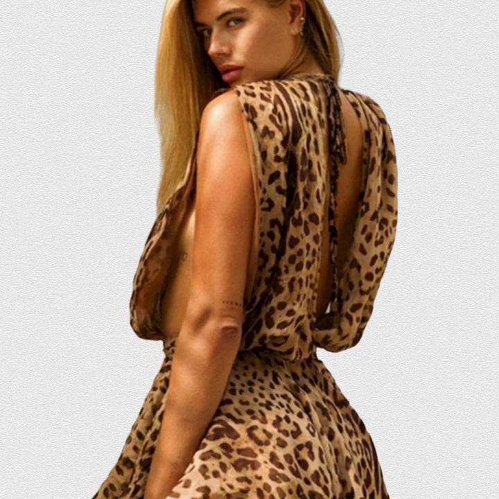 Damernas Lekfulla Miniklänning med extravaganta Leopardenmönster och djupt V-ringning Eva Jonsson-Eva Jonsson