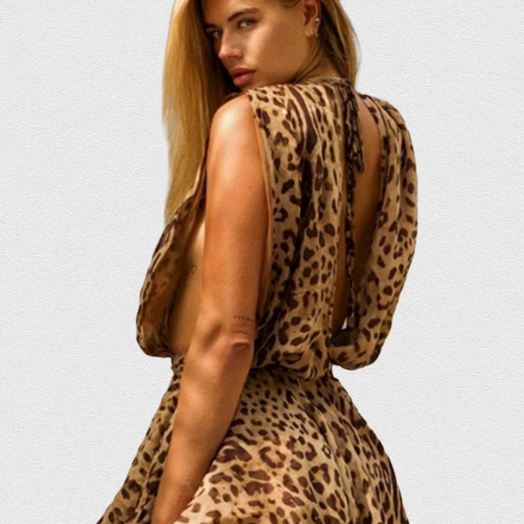 Damernas Lekfulla Miniklänning med extravaganta Leopardenmönster och djupt V-ringning Mirla-Eva Jonsson