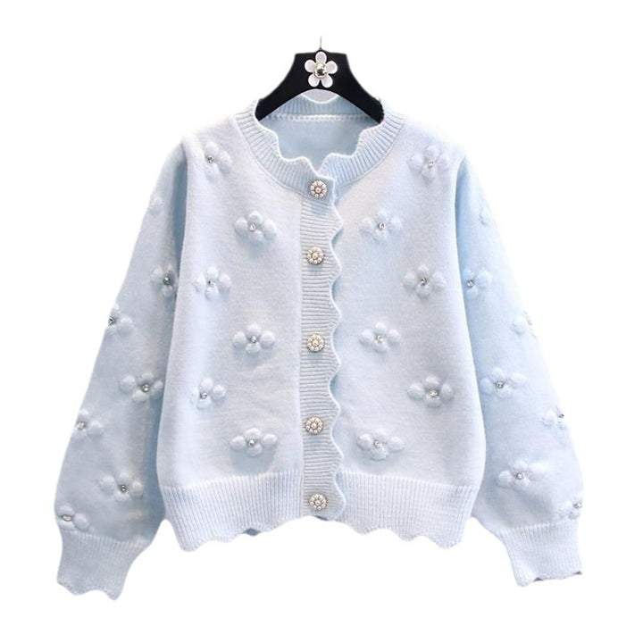 Damernas Lekfulla Strickcardigan med Dekorativa Pärlknappar och Blommönster Mirla-Eva Jonsson