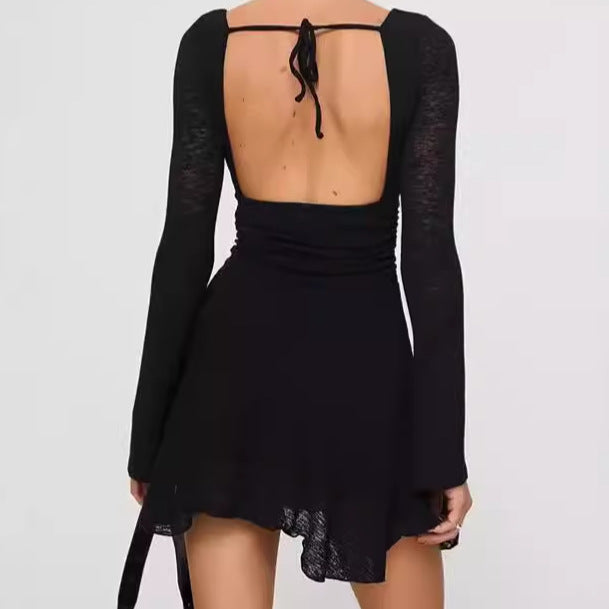 Damernas Lekfullt skuret miniklänning med V-ringning och långa ärmar Eva Jonsson-Eva Jonsson