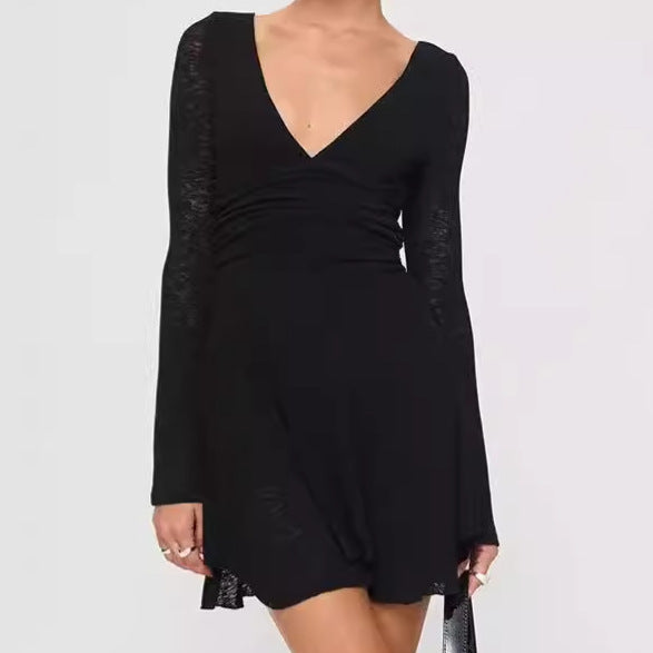Damernas Lekfullt skuret miniklänning med V-ringning och långa ärmar Eva Jonsson-Eva Jonsson