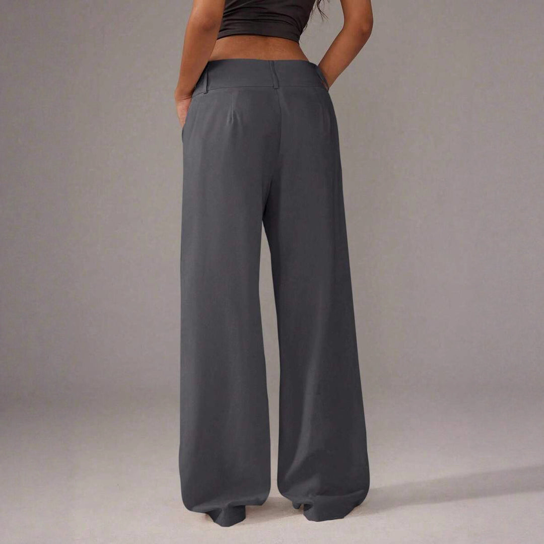 Damernas Löst skurna Palazzo-byxor med eleganta knappdetaljer Eva Jonsson-Eva Jonsson