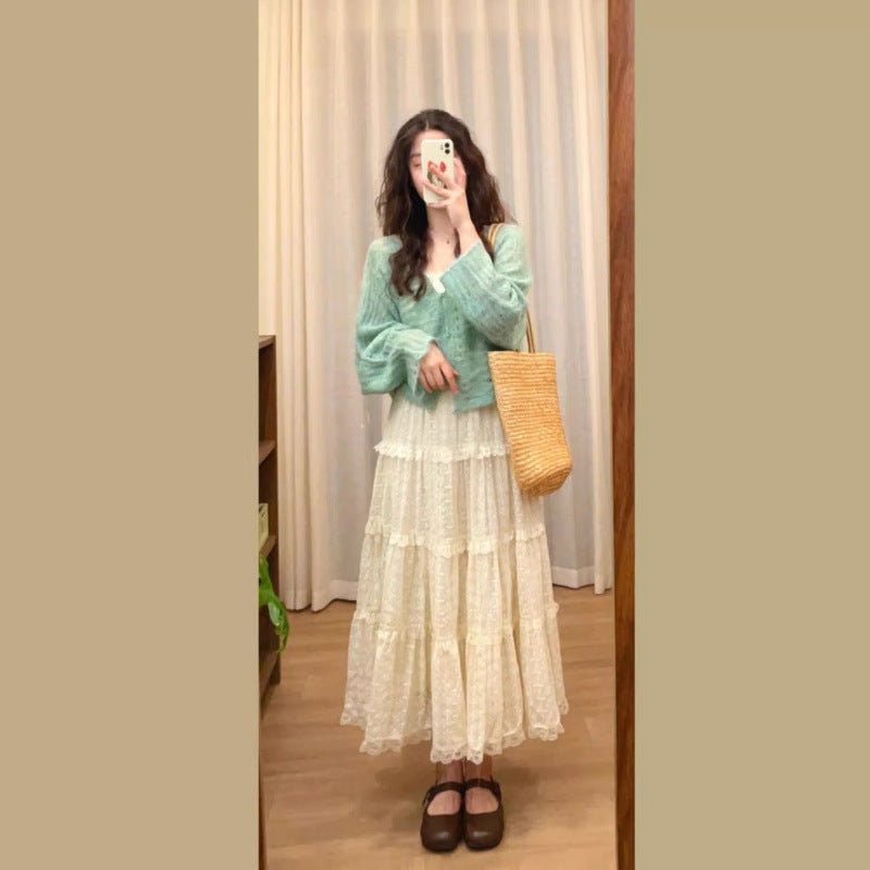 Damernas Luftig Stickad Cardigan med Fint Hålmönster och Vid Passform Eva Jonsson-Eva Jonsson