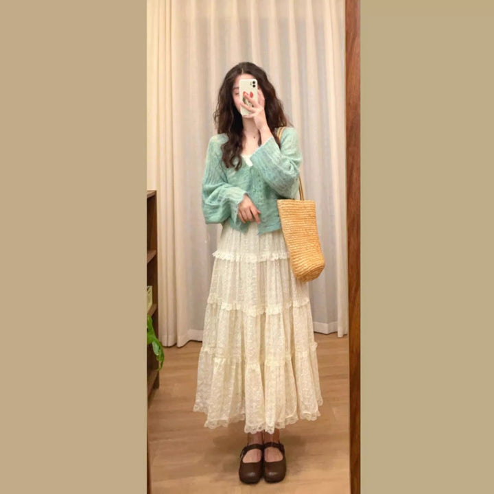 Damernas Luftig Stickad Cardigan med Fint Hålmönster och Vid Passform Eva Jonsson-Eva Jonsson