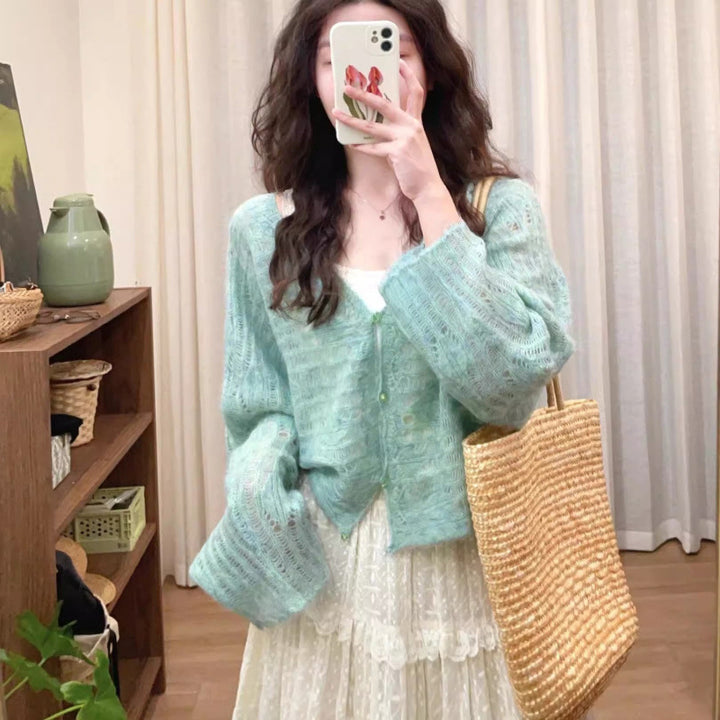 Damernas Luftig Stickad Cardigan med Fint Hålmönster och Vid Passform Eva Jonsson-Eva Jonsson