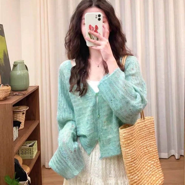 Damernas Luftig Stickad Cardigan med Fint Hålmönster och Vid Passform Eva Jonsson-Eva Jonsson