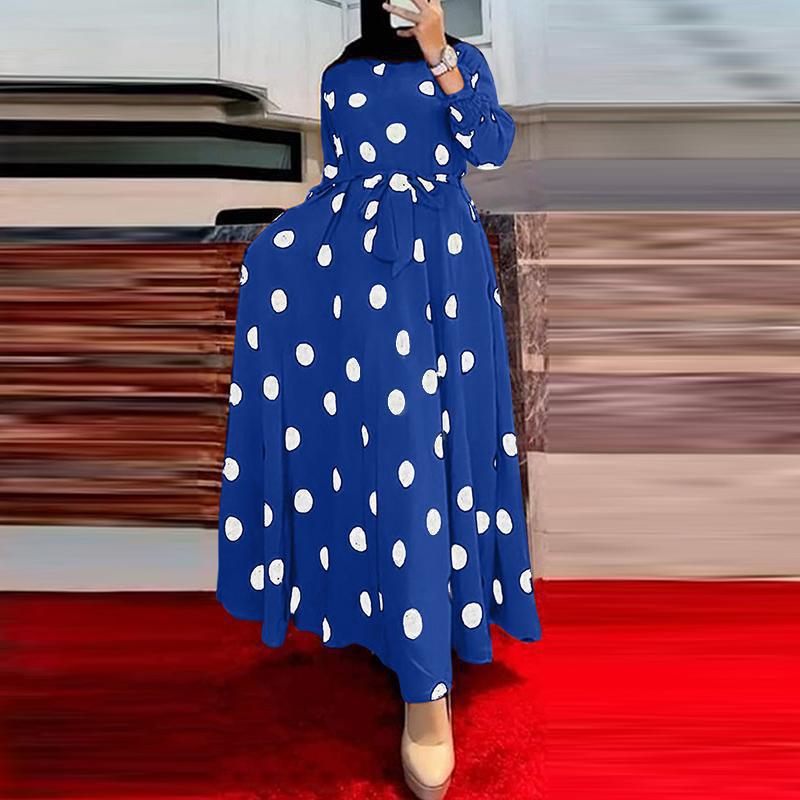 Damernas Maxi-klänning med asymmetrisk fåll och elegant prickmönster Mirla-Eva Jonsson