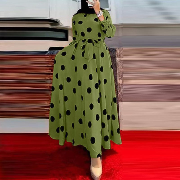 Damernas Maxi-klänning med asymmetrisk fåll och elegant prickmönster Mirla-Eva Jonsson