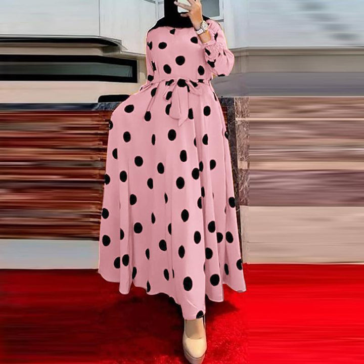 Damernas Maxi-klänning med asymmetrisk fåll och elegant prickmönster Mirla-Eva Jonsson