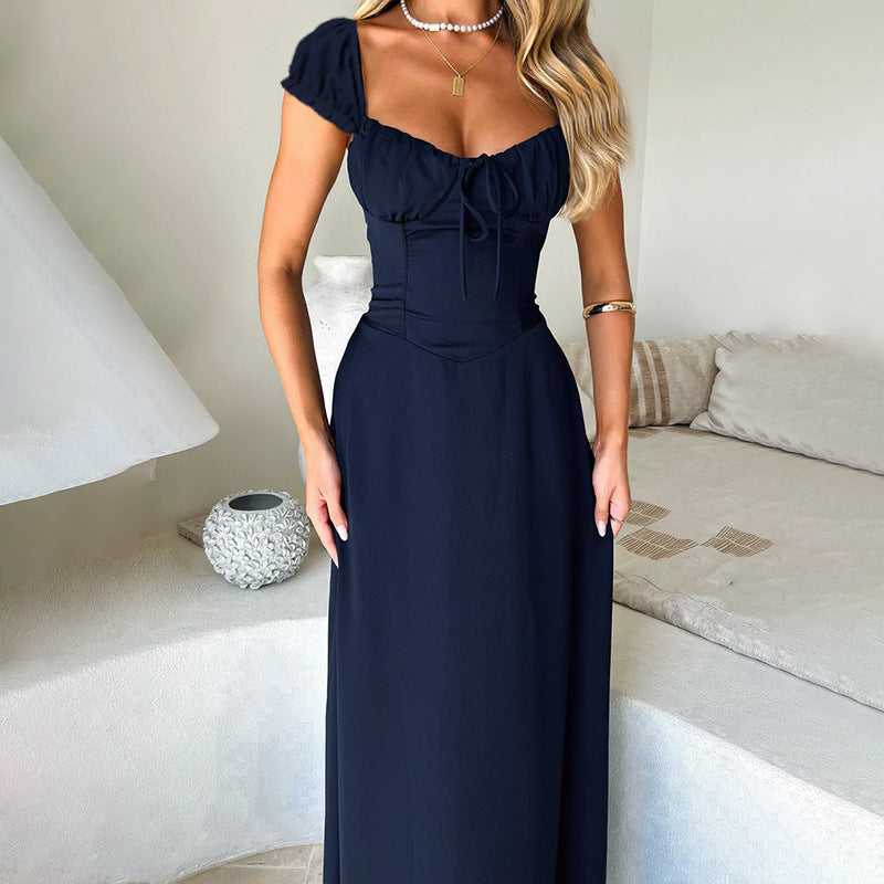Damernas Maxiklänning med Elegant Snördetalj och Puffärmar Mirla-Eva Jonsson