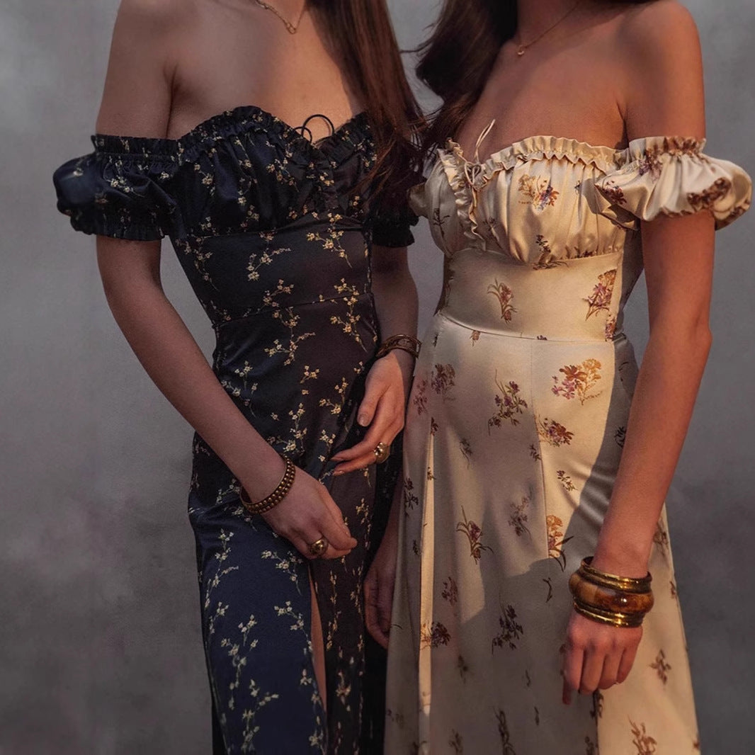 Damernas Maxiklänning med blommig tryck och elegant volangdetalj Mirla-Eva Jonsson