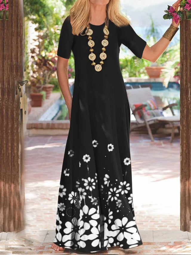 Damernas Maxiklänning med blommigt tryck och sidofickor Eva Jonsson-Eva Jonsson