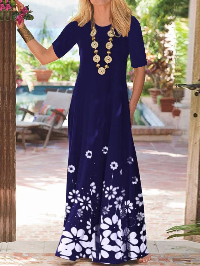 Damernas Maxiklänning med blommigt tryck och sidofickor Eva Jonsson-Eva Jonsson