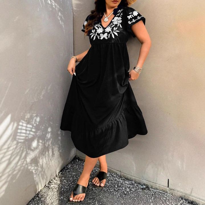 Damernas Maxiklänning med blommönster broderi och voluminös kjol Eva Jonsson-Eva Jonsson