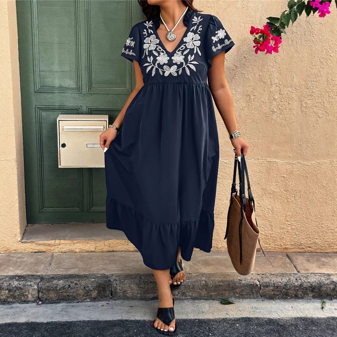 Damernas Maxiklänning med blommönster broderi och voluminös kjol Mirla-Eva Jonsson